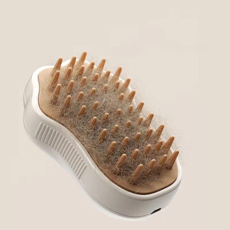 Brosse de toilettage 3-en-1 pour chiens et chats avec vapeur légère, élimination des poils et des nœuds, massage relaxant et entretien du pelage.